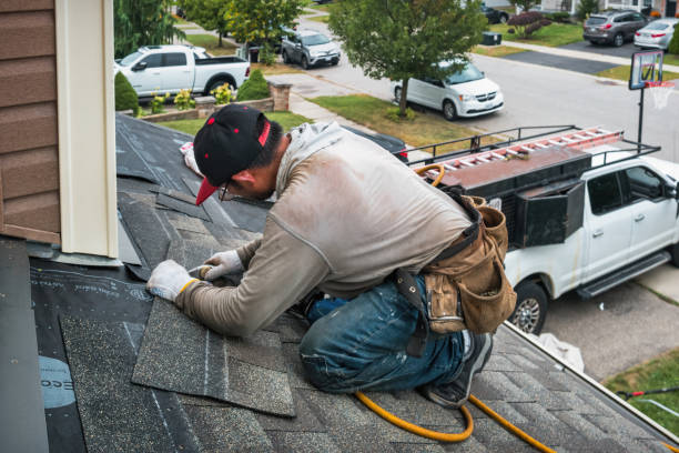 Professional Roof Replacement technician working in Clay City, IN